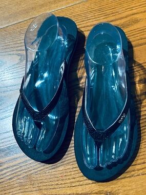 Women’s Black Flip Flop Sandals with Striped Straps